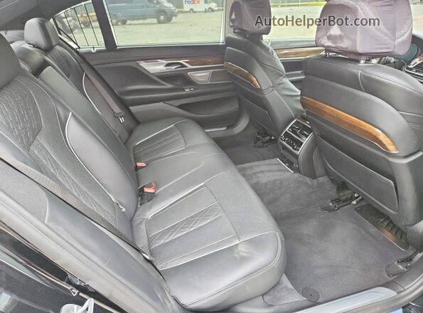 WBA7F2C51JG423935 2018 BMW 7 SERIES Black Rear seats view