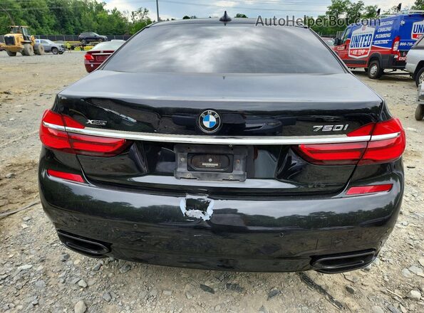 WBA7F2C51JG423935 2018 BMW 7 SERIES Black Rear view