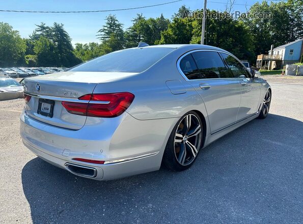 WBA7F2C52GG418042 2016 BMW 7 SERIES Серебряный Задняя правая четверть