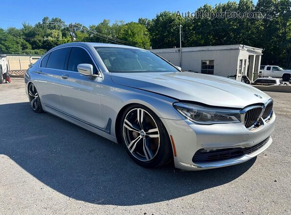WBA7F2C52GG418042 2016 BMW 7 SERIES Серебряный Передняя правая четверть