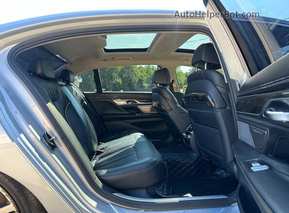 WBA7F2C52GG418042 2016 BMW 7 SERIES Серебряный Вид сзади