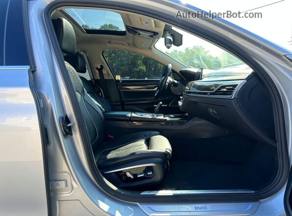 WBA7F2C52GG418042 2016 BMW 7 SERIES Серебряный Вид салона спереди
