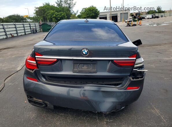 WBA7F2C52GG418655 2016 BMW 7 SERIES Silver უკანა ხედი