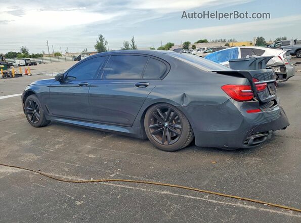 WBA7F2C52GG418655 2016 BMW 7 SERIES Silver უკანა მარცხენა
