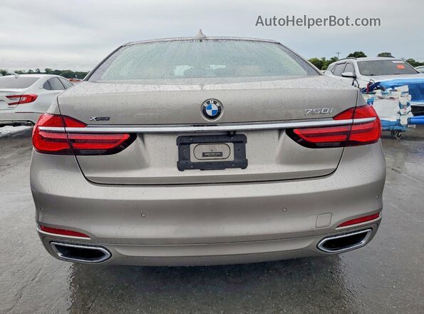 WBA7F2C52HG421878 2017 BMW 7 SERIES Серебряный Вид сзади