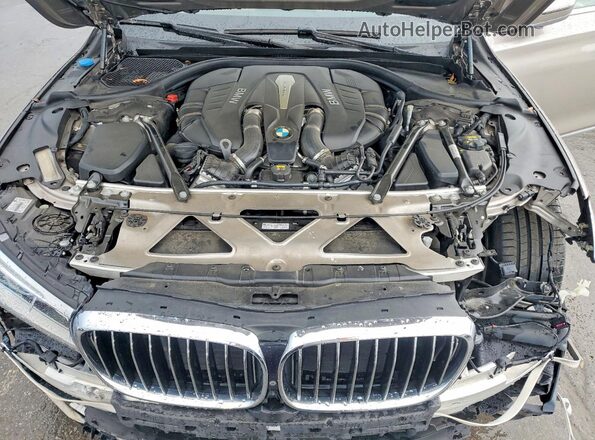 WBA7F2C52HG421878 2017 BMW 7 SERIES Серебряный Вид задней части салона