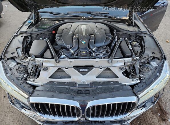 WBA7F2C53GG420348 2016 BMW 7 SERIES Black Вид задньої частини салону