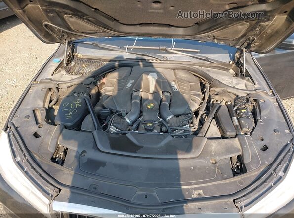 WBA7F2C55GG416043 2016 BMW 7 SERIES Black Rear view
