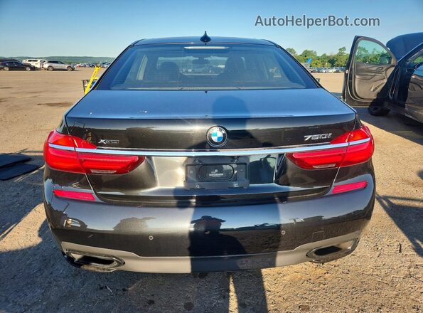 WBA7F2C55GG420299 2016 BMW 7 SERIES Black Вид ззаду