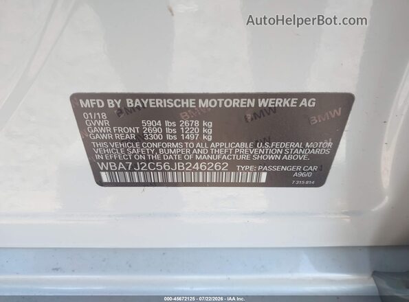 WBA7J2C56JB246262 2018 BMW 7 SERIES White Engine compartment view