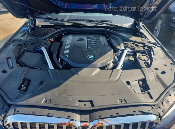 WBA7T4C0XNCK11394 2022 BMW 7 SERIES Blue Vista interior trasera
