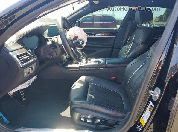 WBA7U2C02MCF50041 2021 BMW 7 SERIES Черный Вид салона спереди