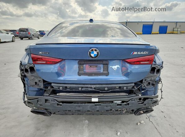 WBA83DA07SCU13693 2025 BMW M4 Blue Widok z tyłu