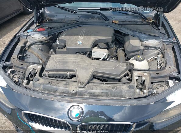 WBA8A3C31HK692399 2017 BMW 3 SERIES Black Rear view