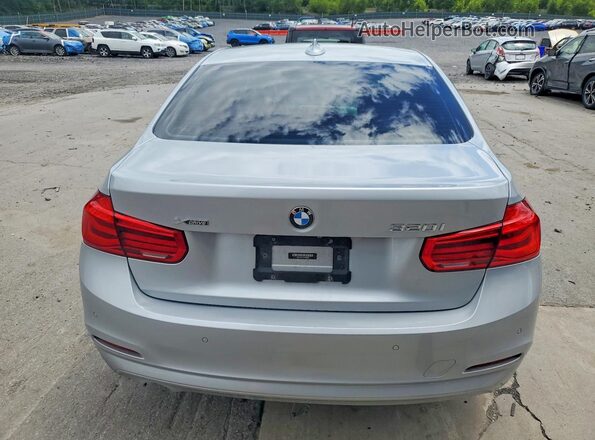 WBA8A3C53JA489382 2018 BMW 3 SERIES Серебряный Вид сзади