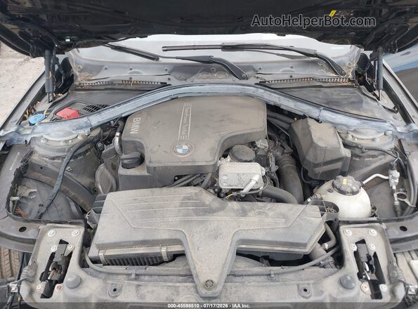 WBA8A3C56JA494754 2018 BMW 3 SERIES Black Rear view