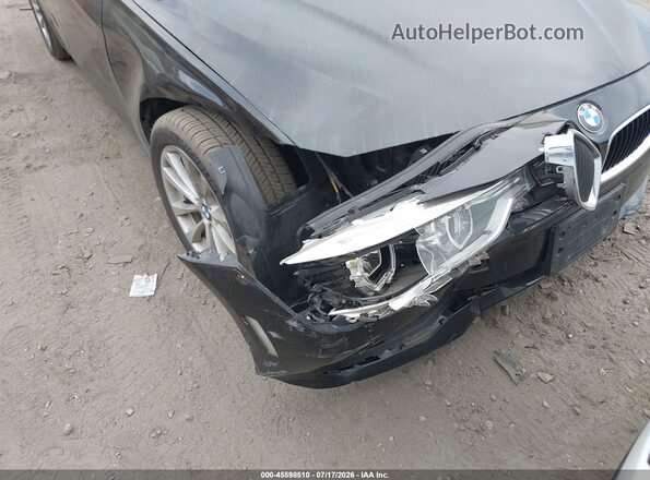 WBA8A3C56JA494754 2018 BMW 3 SERIES Black Front view