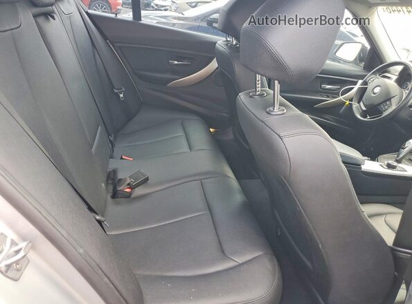 WBA8A9C52JAH14879 2018 BMW 3 SERIES Silver Rear seats view