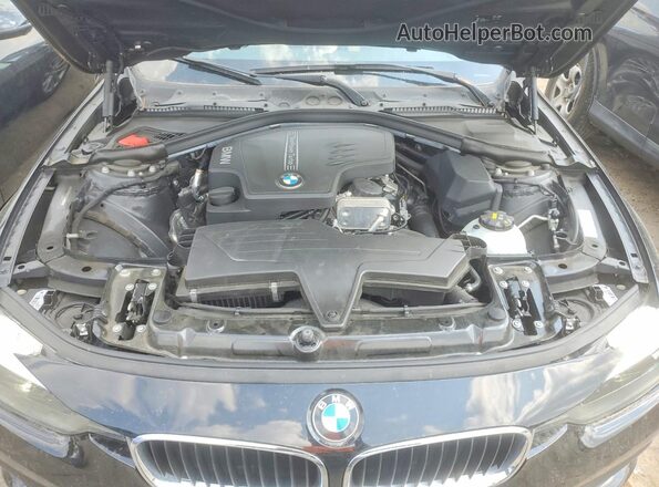 WBA8A9C5XGK616585 2016 BMW 3 SERIES Black Սալոնի հետևի տեսք