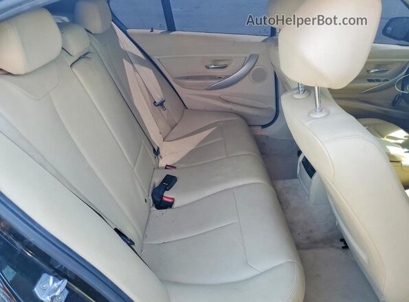 WBA8A9C5XGK617039 2016 BMW 3 SERIES Black Vista de los asientos traseros
