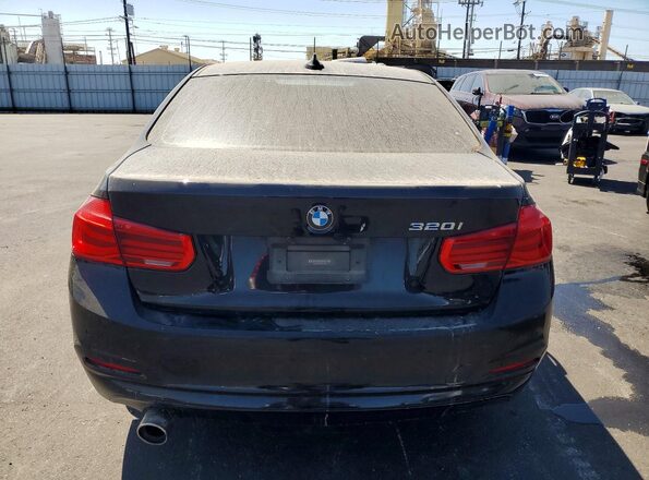 WBA8A9C5XGK617039 2016 BMW 3 SERIES Black Vista trasera