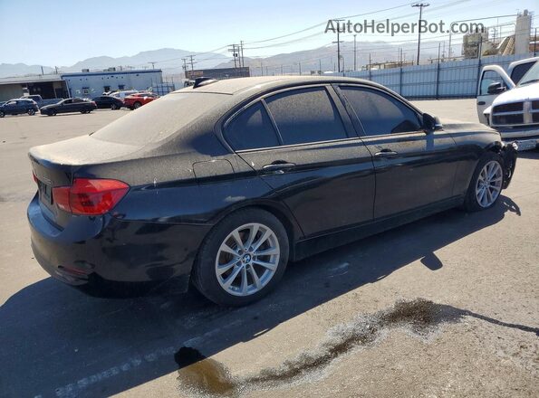 WBA8A9C5XGK617039 2016 BMW 3 SERIES Black Trasero derecho