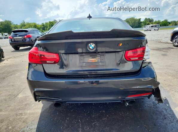 WBA8B3G3XHNU36042 2017 BMW 3 SERIES Black Rear view