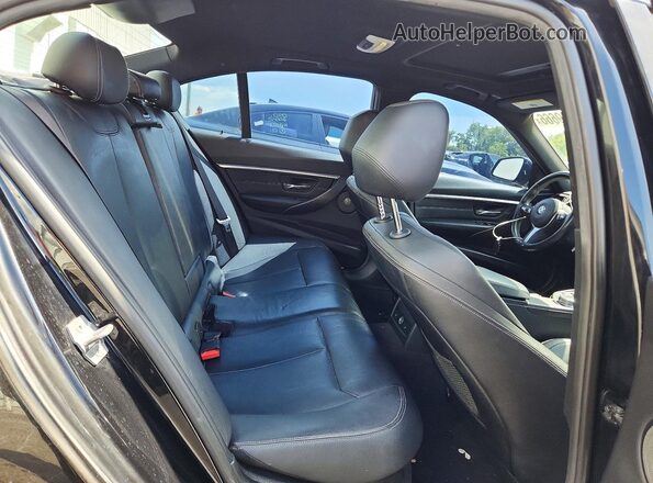 WBA8B3G3XHNU36042 2017 BMW 3 SERIES Black Rear seats view