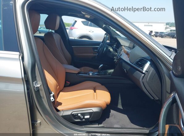 WBA8B3G52GNT62972 2016 BMW 3 SERIES Gold Вид салону спереду