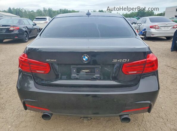 WBA8B7C33HK858507 2017 BMW 3 SERIES Black Вид ззаду