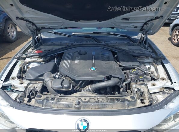 WBA8B7G53GNT95244 2016 BMW 3 SERIES Silver Vista trasera