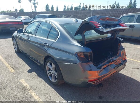WBA8B9C52JEE82256 2018 BMW 3 SERIES Gray Trasero izquierdo