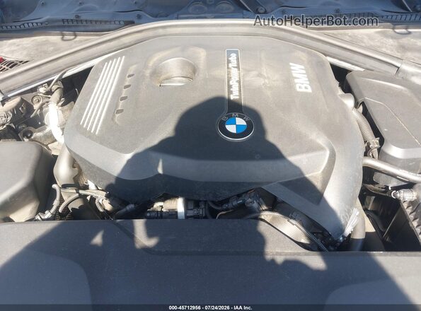 WBA8B9C52JEE82256 2018 BMW 3 SERIES Gray Vista trasera