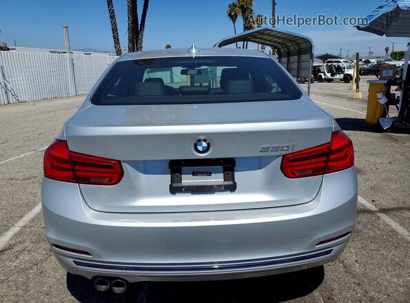 WBA8B9C57JEE82186 2018 BMW 3 SERIES Серебряный Вид сзади