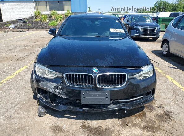WBA8D9C51JEM31628 2018 BMW 3 SERIES Black Front view