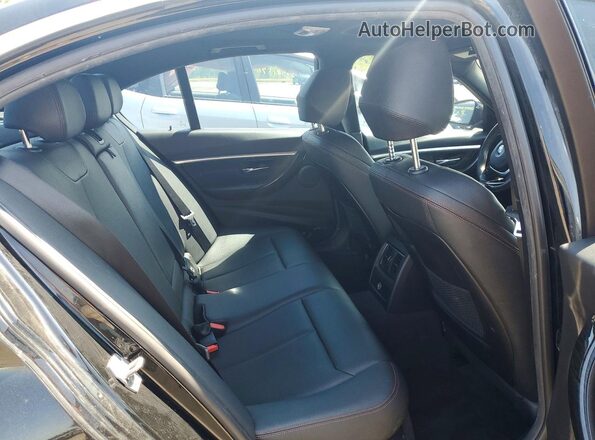 WBA8D9C51JEM31628 2018 BMW 3 SERIES Black Rear seats view