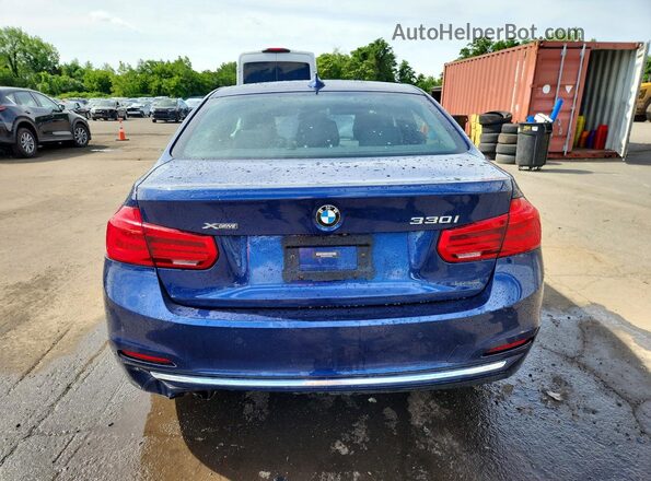 WBA8D9C52JA608386 2018 BMW 3 SERIES Blue Rear view