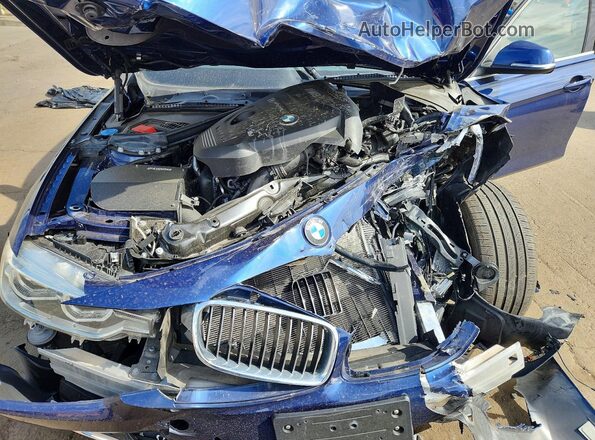 WBA8D9C52JA608386 2018 BMW 3 SERIES Blue Rear interior view
