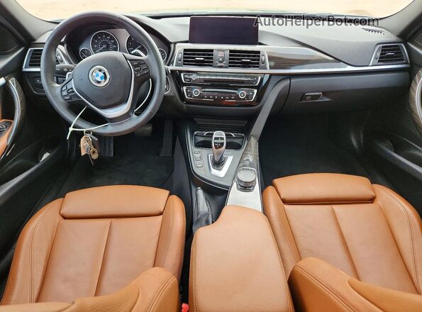 WBA8D9G30HNU62226 2017 BMW 3 SERIES Gray Widok deski rozdzielczej