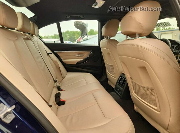 WBA8D9G33HNU66464 2017 BMW 3 SERIES Blue Vista de los asientos traseros