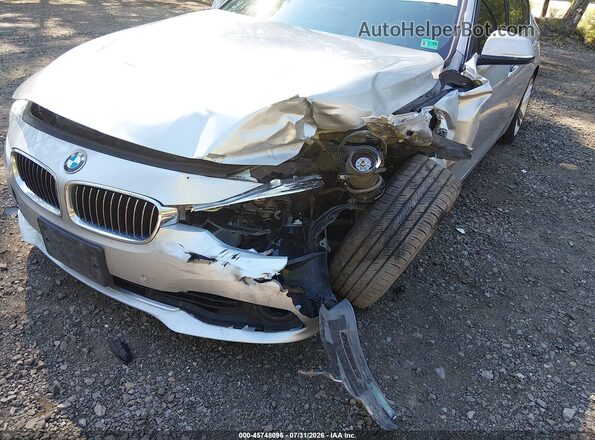 WBA8D9G50HNU59487 2017 BMW 3 SERIES Серебряный Вид спереди