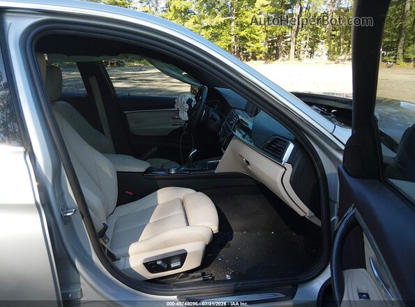 WBA8D9G50HNU59487 2017 BMW 3 SERIES Серебряный Вид салона спереди
