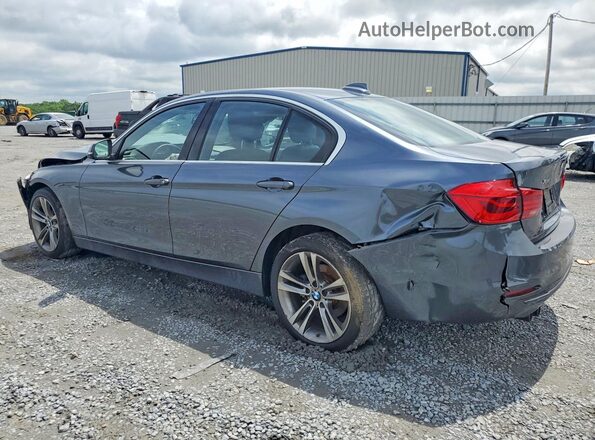 WBA8D9G53JNU66648 2018 BMW 3 SERIES Charcoal Trasero izquierdo