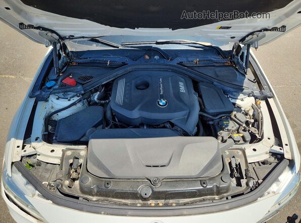 WBA8D9G57JNU71299 2018 BMW 3 SERIES White Rear interior view