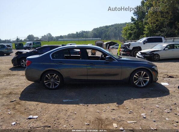 WBA8D9G5XJNU72222 2018 BMW 3 SERIES Gray Vista interior trasera