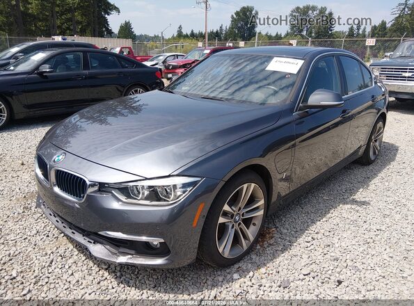 WBA8E1C30HA029680 2017 BMW 3 SERIES Gray Vista tres cuartos delantera izquierda