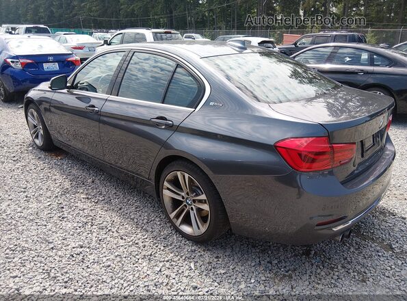 WBA8E1C30HA029680 2017 BMW 3 SERIES Gray Trasero izquierdo