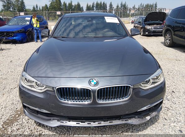WBA8E1C30HA029680 2017 BMW 3 SERIES Gray Vista del cuadro de instrumentos