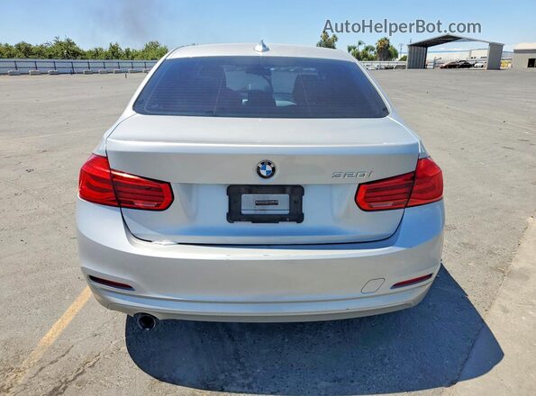 WBA8E1G56HNU14875 2017 BMW 3 SERIES Silver Widok z tyłu