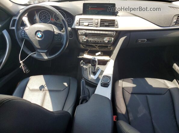 WBA8E1G56HNU14875 2017 BMW 3 SERIES Silver Widok deski rozdzielczej